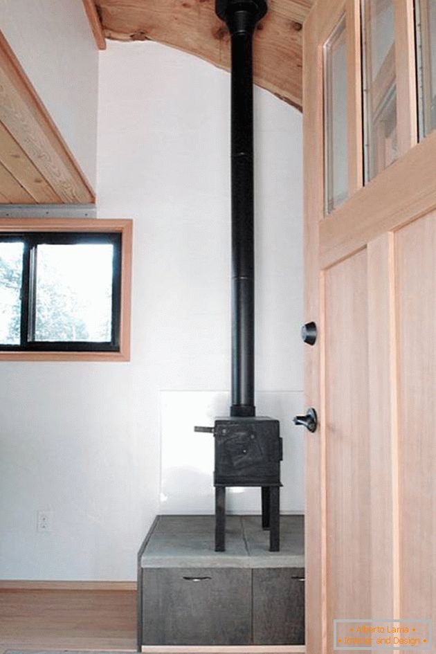 Interior of the house on wheels: wood stove