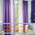 White and purple curtains in the interior of the living room