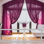 Drapery of purple curtains and white curtains