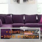 Spacious purple sofa with pillows
