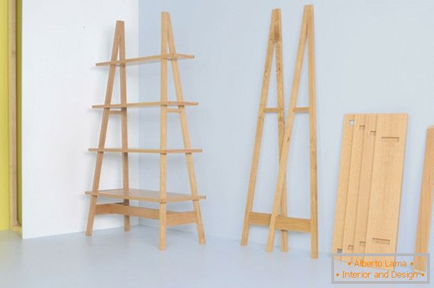 Collapsible shelving in the interior of a small room