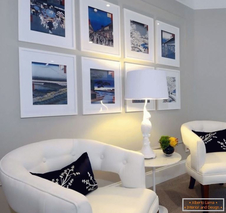 White armchairs in the interior of the living room