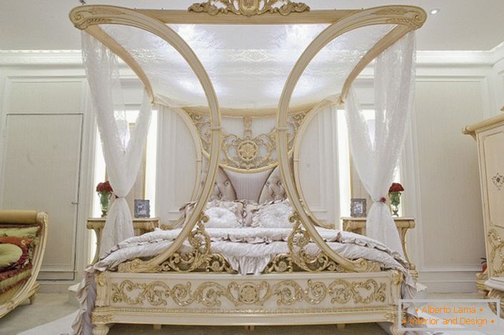 A luxurious canopy in the bedroom in the Baroque style. Excellent design project for a family bedroom.