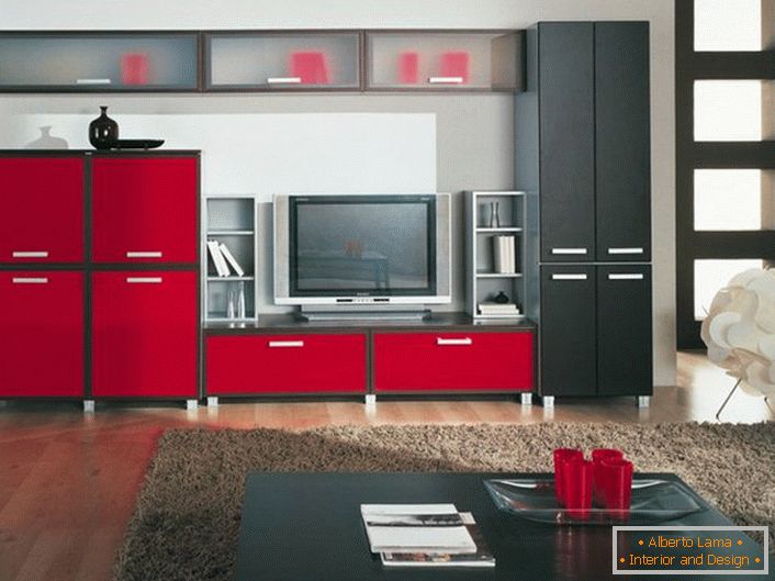 Calling, a bright combination of red and black in the interior of the guest room. Functional modular wall is spacious and looks great in the overall design concept.