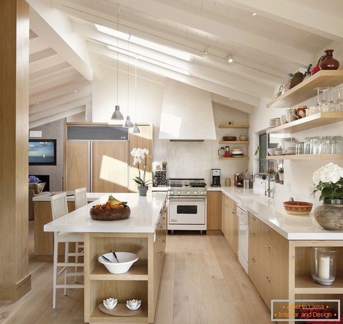 Kitchen in the attic is organized in accordance with the requirements of the Scandinavian style. Unusual window arrangement excellent access to daylight. 