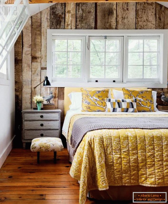 The hostess of the dwelling, most likely, refers to the number of needlewomen. Country style in the bedroom welcomes quilts, pillowcases in style