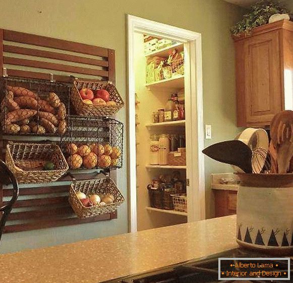 Storage of vegetables in the kitchen in baskets and boxes