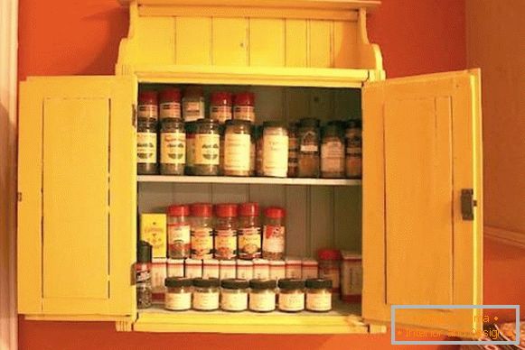 Spice cabinet on kitchen wall