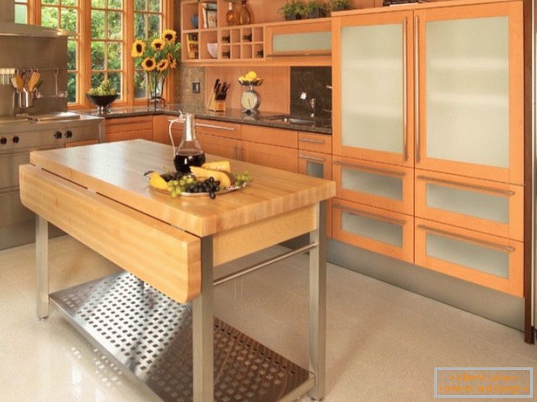 Kitchen island with a folding table top