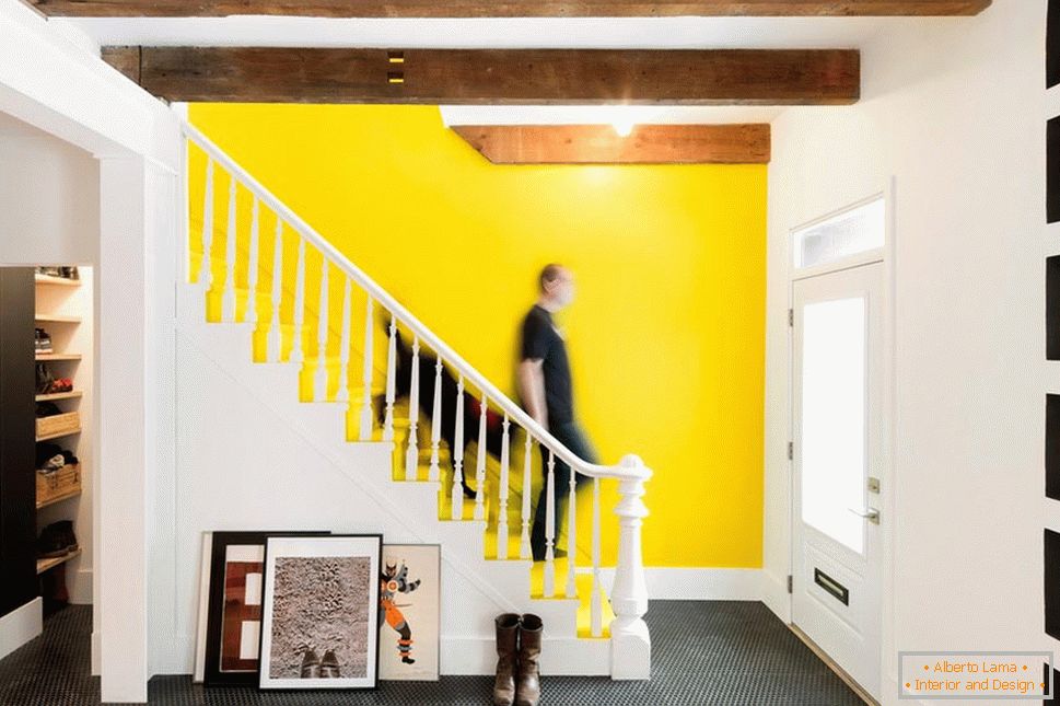 Bright wall above the stairs and black floor