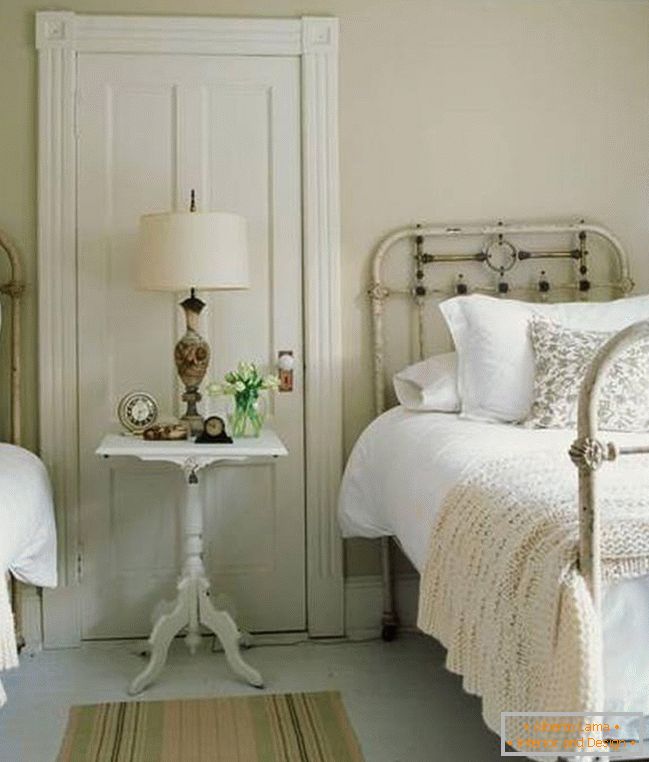 Antique iron beds in the guest room