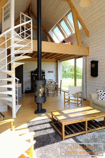 Interior of a small wooden house in two levels