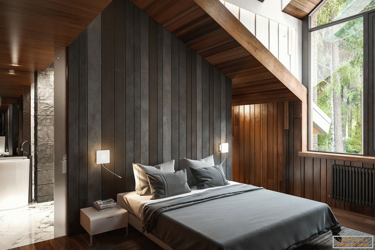 Attic with a gray bed