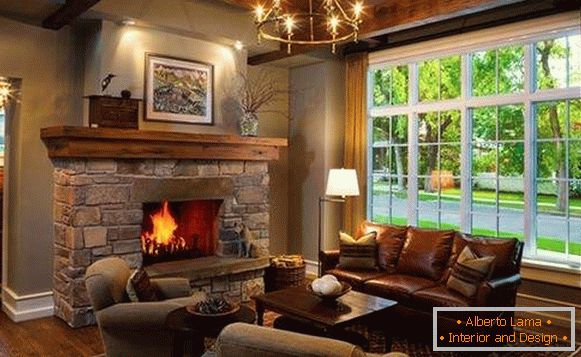 Interior of a wooden living room with a fireplace in a private stone house