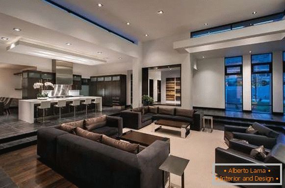 Interior of a large living room kitchen in the design of a private house