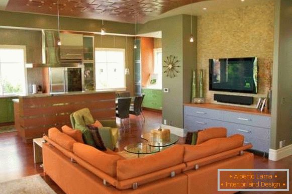 Orange green interior of the kitchen of the living room in a private house