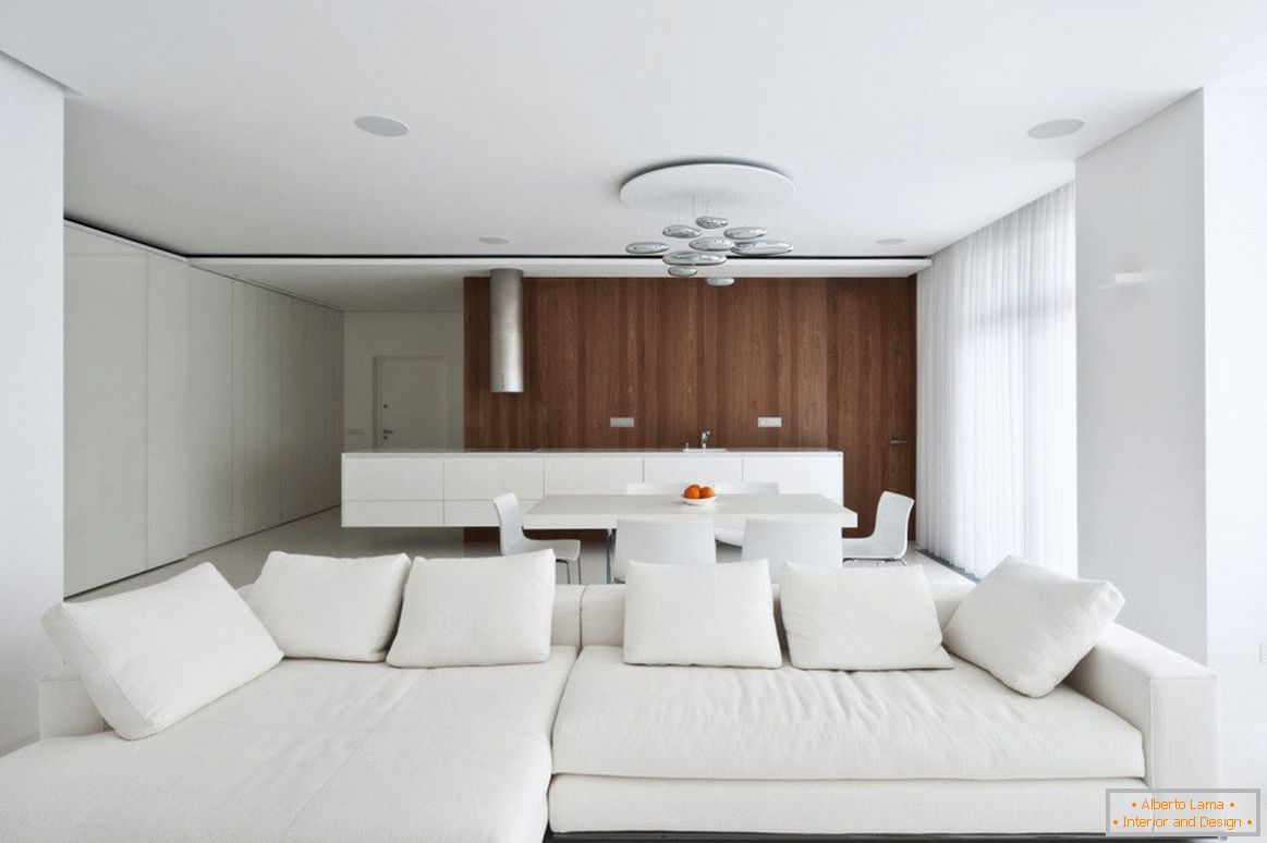 White upholstered furniture in the interior of the living room