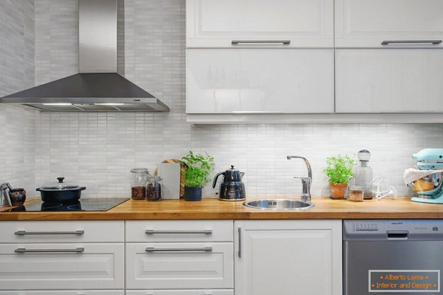 Glossy furniture in the interior of a small kitchen