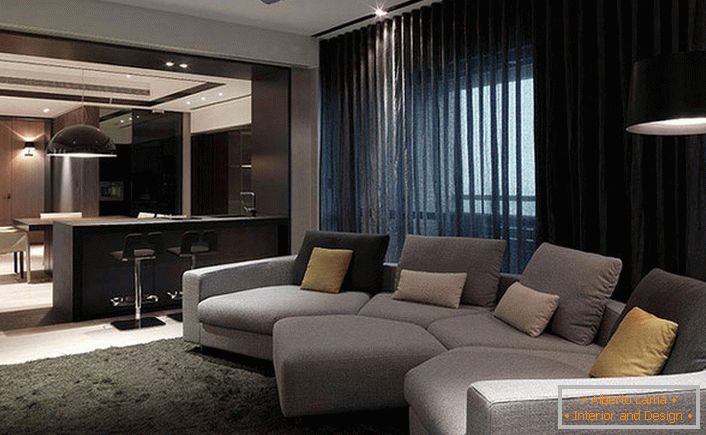 The ceiling and walls of the room are high-tech monochrome, the furniture is necessarily under the main color of the room.