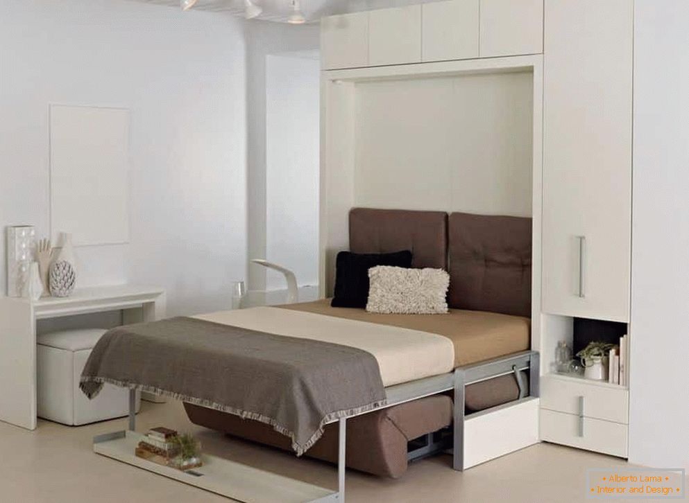 Sofa-bed transformer in a white closet in a not large room