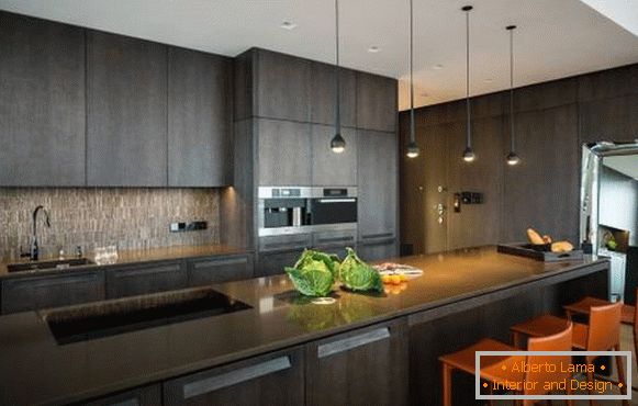 Dark gray kitchen in high-tech style on the photo