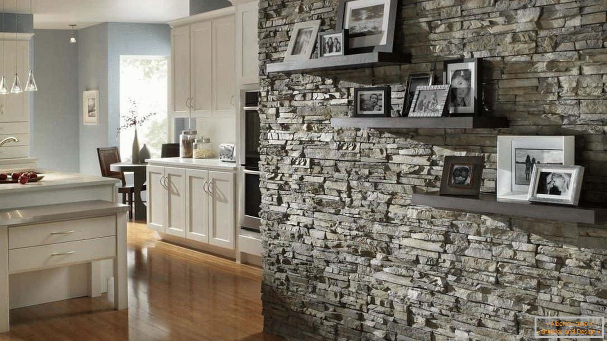 Interior decoration of the wall with artificial stone