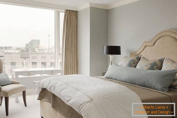 The combination of gray and beige in the interior of the bedroom