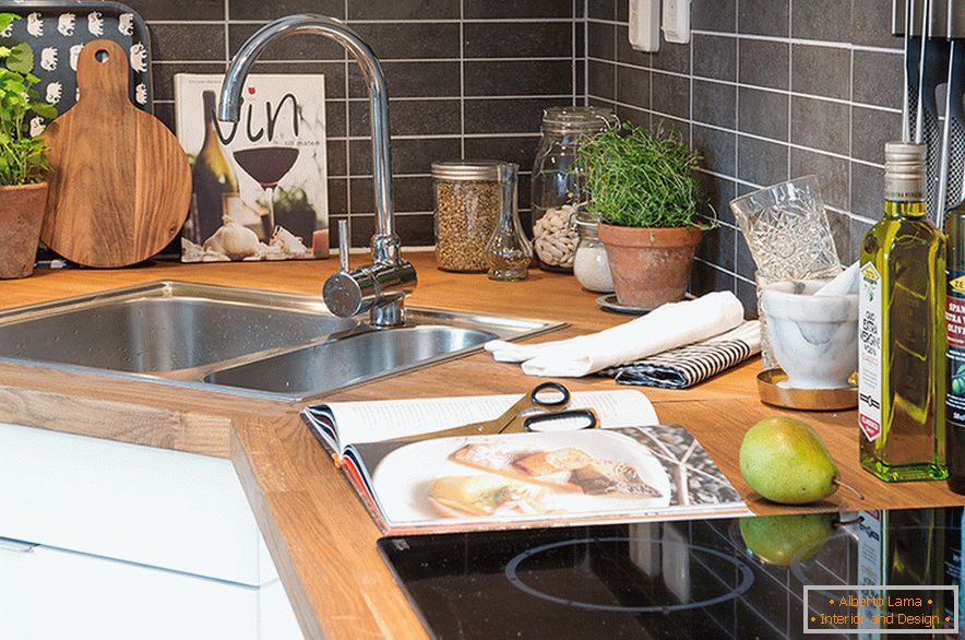 Design of a cozy attic kitchen in a Swedish city