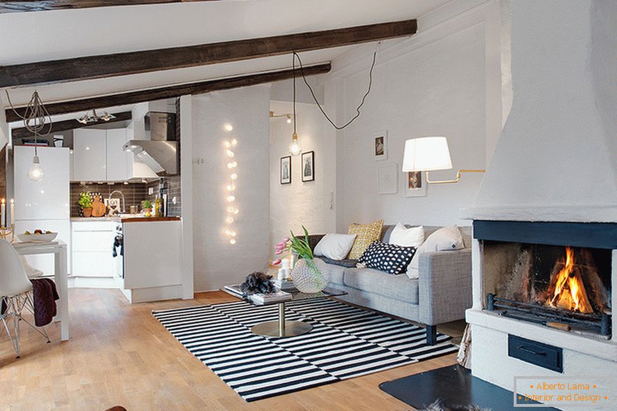 Fireplace in the interior of a cozy attic in a Swedish city