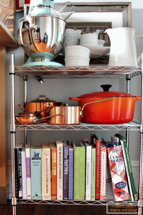 A shelf for dishes and books in the kitchen