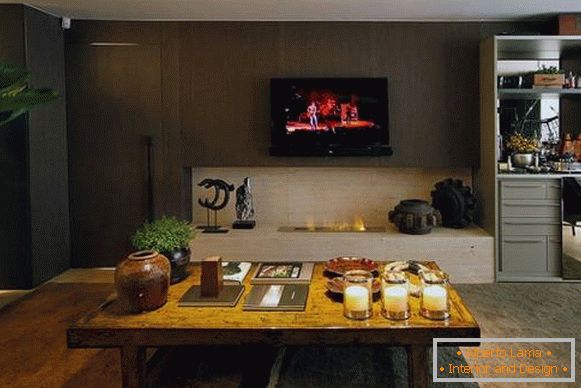 Living room with bio fireplace in the apartment