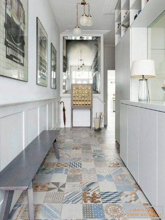 Interior of a narrow corridor with beautiful furniture and a built-in wardrobe