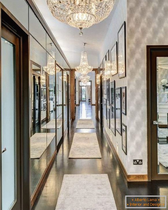 Chic chandeliers in a narrow corridor - photo design with mirrors