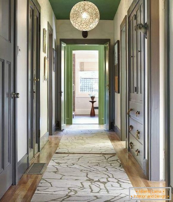 Stylish narrow corridor - a photo with a green ceiling