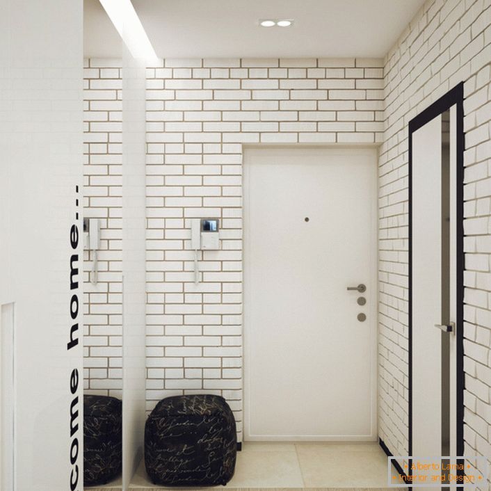 Masonry of white brick in the hallway