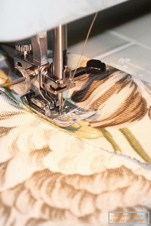 make a stitch along the edge of the folded fabric