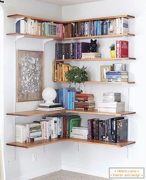 Corner shelves for books and decor on the wall