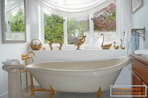 Design of a bathroom with gold ornaments