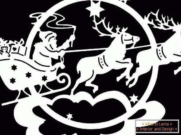 We decorate the windows for the New Year 2017 - stencils of Santa Claus