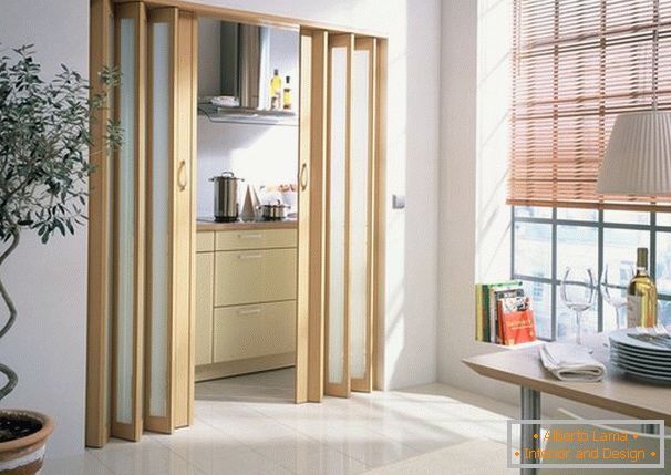 Folding doors to the kitchen