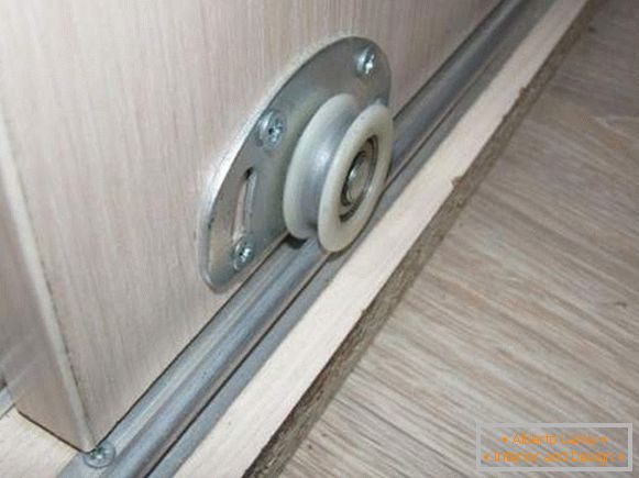 Rail doors for built-in wardrobe compartment
