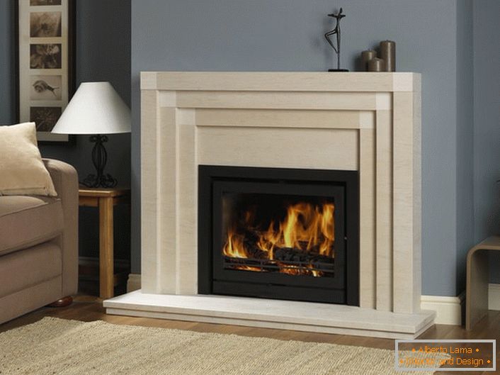 In the living room fireplace with flame imitation performs not only a decorative function. In the cold season, it heats the room.