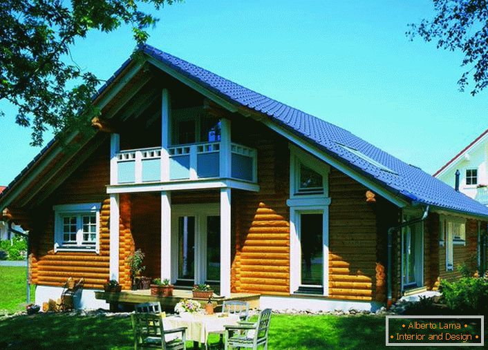 Scandinavian house made of log house - the most common variation of suburban real estate. Attractive exterior in combination with a relatively low price of construction make houses in the Scandinavian style popular and in demand.