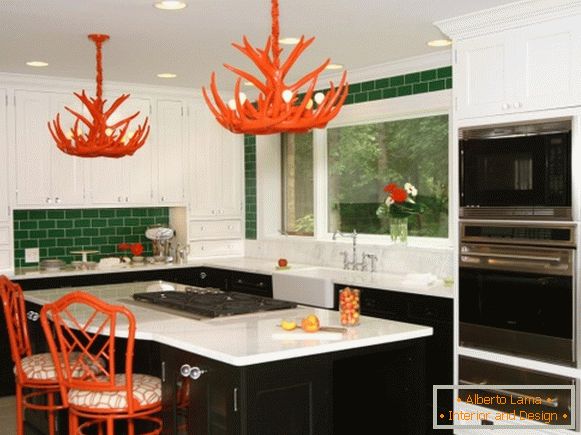 Kitchen with green walls and red decor