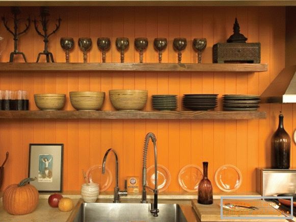 Kitchen design with orange walls