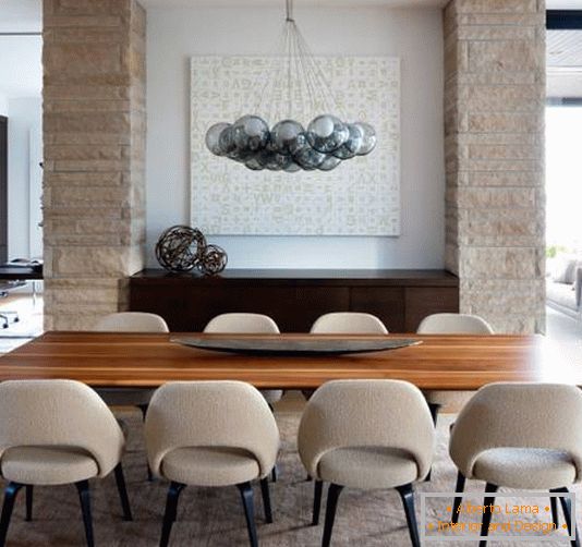 Modern chandelier above the dining table