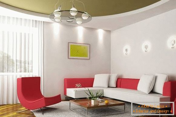 Green stretch ceiling in the design of the living room in a modern style