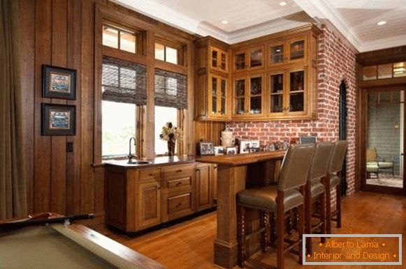 Kitchen design with brick wall and wood trim