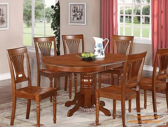 Pedestal table and chairs in early American style