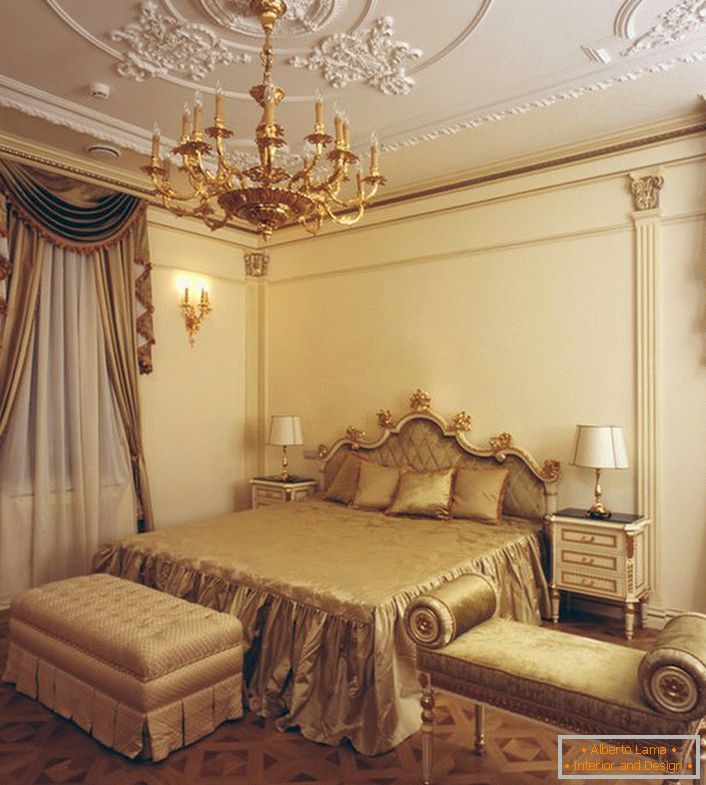 Bedroom in Empire style. Restrained interior design makes the room light, spacious and not cluttered. 